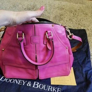 Dooney purse never used, it also had registration